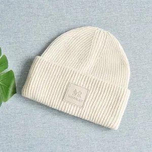 Unisexe en gros Logo personnalisé côtelé laine tricot bonnets hiver luxe chaud revers bonnet chapeau pour femmes hommes