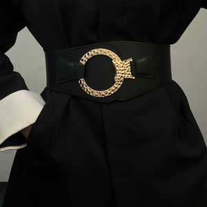 Cintura da donna versatile, elegante e sofisticata, con fibbia rotonda, abbinabile a gonne, abiti e tailleur; cintura elastica in vita. - Product Image 1