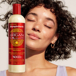 Crème de soin capillaire intensive à l'huile d'argan Creme of Nature pour une hydratation profonde, une force accrue et une réparation des dommages - Product Image 1