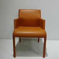 Chaise avec accoudoirs en métal orange pour salle à manger en cuir