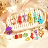 B63935 Moule en silicone DIY pour résine époxy, motifs fleur, papillon, cœur, lettre, plume, nuage, pour pendentifs boucles d'oreilles avec trou