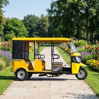 Tricycle Électrique E-Tuk d'Usine, Auto-Rickshaw 2000W 60V, Autonomie 150-250km, Vitesse 40km/h, 9 Places, Cabine Fermée, pour Transport de Passagers (Tuk-tuk)