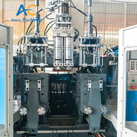 Machine de soufflage par extrusion pour bouteilles en plastique PET/HDPE/PP de 2L, 3L, 4L pour liquides de lessive, avec moteur à roulement automatique et haute production.