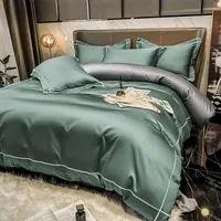 Vente en gros d'usine de drap de lit brodé de luxe 100% coton bon marché lot de literie pour hôtel housse de couette taie d'oreiller drap plat