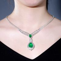 SGARIT Fine Jewelry Colliers Or 18 carats Production afghane 11.36ct + Production colombienne 2.25ct l Collier émeraude