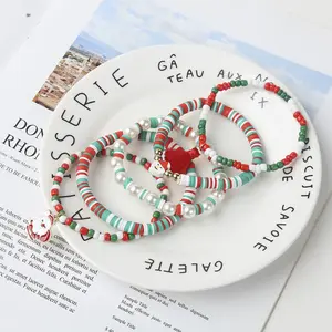 Zooying Christmas Bracelet Suppliers Designer Santa Claus Christmas Tree Snowflake Polymer Clay Elastic Beaded Charm Bracelet