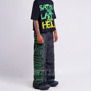 Pantalones de nailon para hombre con logo bordado de poliéster, cintura elástica y diseño de patchwork - Product Image 4