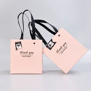 重复使用的可回收定制购物纸袋，带标志粉色纸袋维多利亚秘密
