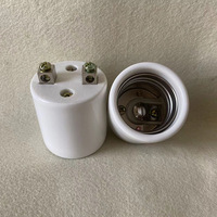 Approvisionnement direct usine : Nouveaux supports de lampe E40 en porcelaine haute fréquence, bases et fixations, têtes de lampe en céramique en forme de fleur de prunier, 250V 400A