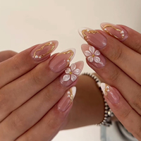 Faux ongles à presser en amande, style français, avec nœud et strass brillants, motifs floraux et pois