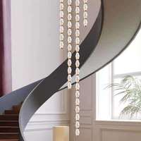 Lustre long moderne en forme de collier de boules de cristal, style Art Déco nordique, pour escalier, salle à manger, villa