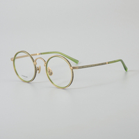 Gafas Ópticas Unisex Retro de Negocios, Montura de Titanio Puro Redonda y Elegante, Modelo New Titan