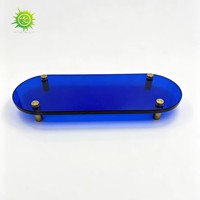 Présentoir en acrylique en gros avec supports métalliques, support de présentation ovale moderne pour bijoux et parfums en magasin