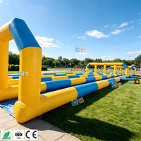 Toboggan aquatique gonflable commercial à double voie, long toboggan aquatique gonflable pour la location en extérieur, dans les jardins et parcs aquatiques