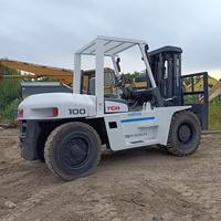 Montacargas Usado TCM FD100 de 10 Toneladas con Desplazador Lateral Hidráulico, Neumáticos Sólidos, Interfaz de Control Humanizada, Motor Diésel de Dos Etapas