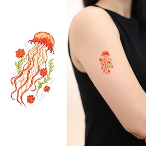 Pegatinas de tatuaje temporal coloridas hermosas medusas Rojas tatuajes impermeables adecuados para cara, brazos y piernas - Product Image 1