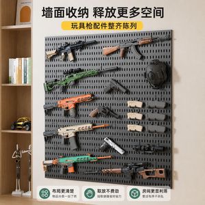 Estante de almacenamiento de pared Qinfeng con tablero perforado para exhibición de pistolas de juguete, instalación con ventosa, material plástico - Product Image 1
