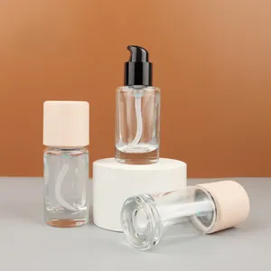 Personalización 30ml botella de vidrio redonda base vacío esmerilado prensa bomba cabeza tapa rosa loción botella contenedor cosmético