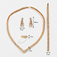 Parure de mariée Vanfi de luxe vintage et tendance en laiton plaqué or avec zircone cubique, 4 pièces : collier en V, boucles d'oreilles pendantes à pampilles, bracelet et bague