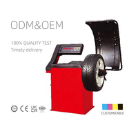 Équilibreur de roue de pneu d'atelier automatique certifié CE 0.2kw équipement de type ascenseur pour l'équilibreur de pneu d'alignement de roue