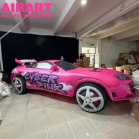 Éclairage LED décoratif pour voiture gonflable rose, modèle de voiture de course gonflable personnalisé pour la publicité