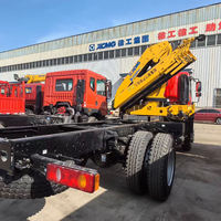 Grue télescopique montée sur camion de 5 tonnes, système de commande à distance sans fil, hauteur de levage maximale de 12,8 m et travaux de levage en construction