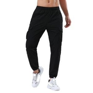 กางเกงแทร็คผู้ชาย สำหรับกิจกรรมกลางแจ้ง ฤดูใบไม้ร่วง ทรงหลวม ผ้าทอ ขาจั๊ม ยืดหยุ่น สำหรับออกกำลังกาย กางเกงคาร์โก้ผู้ชาย มีกระเป๋าข้าง - Product Image 1