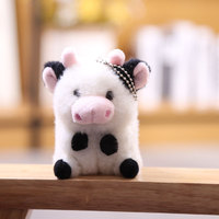 Dessin animé Mavericks quatre pouces en peluche vache poupée Super doux porte-clés et cartable pendentif Mini ours jouet et cadeau d'anniversaire