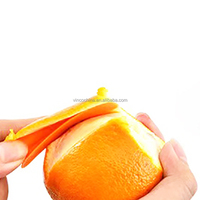 Éplucheur d'orange en plastique créatif facile à enlever l'éplucheur de grenade et de pamplemousse