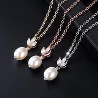 Collier pendentif feuille en zircone cubique, colliers en perles d'imitation d'eau douce pour femmes, bijoux élégants pour mariage, cadeau de mode