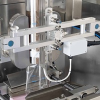 Machine alimentaire verticale de pesage et de remplissage haute précision pour produits automatiques, multi-lignes, pour barres chocolatées au miel, pop-corn et noix grillées