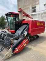 Moissonneuse-batteuse sur chenilles Touxin quasi neuve avec boîte de vitesses automatique et moteur neufs, pour usage agricole, marque réputée, pour maïs, blé, riz