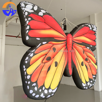 Costume gonflable publicitaire personnalisé en Oxford, modèle papillon avec lumières LED, facile à installer pour les défilés, propulsé par l'effort humain