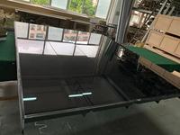 Automatique Sans Cadre noir panneau de verre porte de garage sectionnelle
