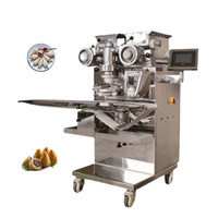 Machine de remplissage de pâte commerciale pour l'égyptien Aish Baladi avec fabricant de desserts farcis au pain sucré aux dattes