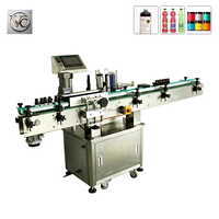 Machine d'étiquetage automatique de bouteilles rondes FKJX avec capteur d'étiquettes pour le collage d'étiquettes sur les bouteilles de jus et de miel