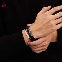 Bracelet en cuir pour hommes en acier inoxydable à la mode de style luxe avec logo personnalisé avec fermoir magnétique