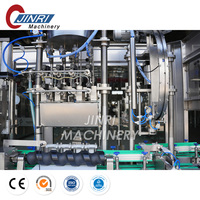 Ligne de production nouvellement automatique pour boisson gazeuse eau gazeuse soda et alcool boisson verre bière Machine de remplissage Fillng Machine