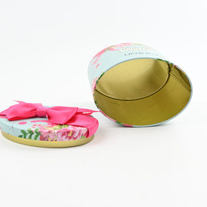 Lata Redonda de Metal con Diseño Floral Personalizado, con Lazo de Cinta, Envase Vacío para Té Negro Premium, Ideal para Regalo - Product Image 3
