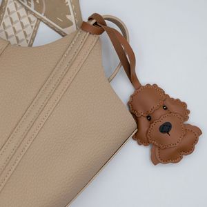 Goreal 2025 nueva llegada bolso de mujer encantos oso de peluche perro juguete caniche cuero muñeca bolso decoración Metal llaveros - Product Image 2