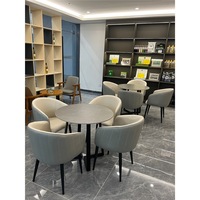 Ensemble de tables de conférence en pierre de style nordique moderne et minimaliste, idéal pour les bureaux de vente, les salons d'affaires et les tables à thé.