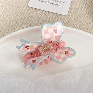 Ventes chaudes : Accessoires pour cheveux en plastique mignons et doux, pinces à cheveux en forme de nœud de couleur bonbon pour les occasions festives - Product Image 6