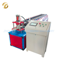 Machine de formage à froid pour acier galvanisé, équipement automatique de poinçonnage de trous pour la fabrication de portes de garage résidentielles et de portes de garage à enroulement.