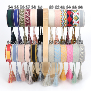 169 Designs 10 pièces en stock Bracelets d'amitié faits main, Bracelets brodés, Bracelets en corde avec pompon, Bracelets tressés réglables, Vente en gros - Product Image 2