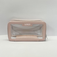 Vente en gros de trousse de maquillage transparente OEM avec logo personnalisé sac à cosmétiques transparent en PVC étuis avec fermeture à glissière sac de vanité en vinyle étanche