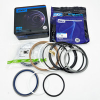 Kit de joint d'excavatrice Kits de joints de cylindre hydraulique Kit de joint de joint central de moteur d'oscillation de soupape de commande