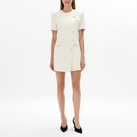 Robe mini élégante pour femme, blazer asymétrique à col rond et manches courtes, boutons sur le devant, poches plaquées, couleur crème, vente en gros sur mesure