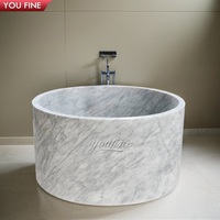 Baignoire de luxe YOUFINE en marbre blanc, sculptée à la main, ronde, pour salle de bain d'hôtel haut de gamme et suite principale de villa