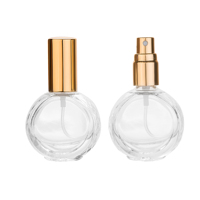 Flacon de parfum rond OEM de 10 ml, flacon pulvérisateur en verre, contenants cosmétiques de beauté, vaporisateur de voyage rechargeable portable