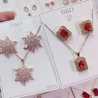 Ensemble de bijoux en cuivre et cristal de zircon de haute qualité, boucles d'oreilles et collier, accessoires de robe micro-incrustés de luxe léger, deux pièces